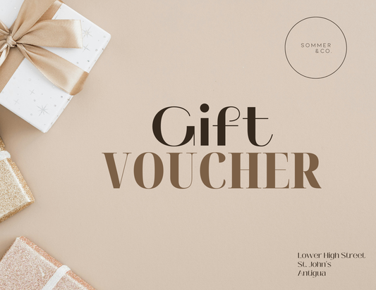 Gift voucher design with a bow-tied gift box on a beige background, featuring the brand 'Sommer & Co'.